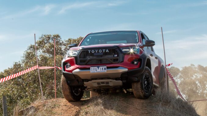 2023 Toyota HiLux GR Sport. Filmed on a closed circuit under controlled conditions. Fresh water crossing shown.