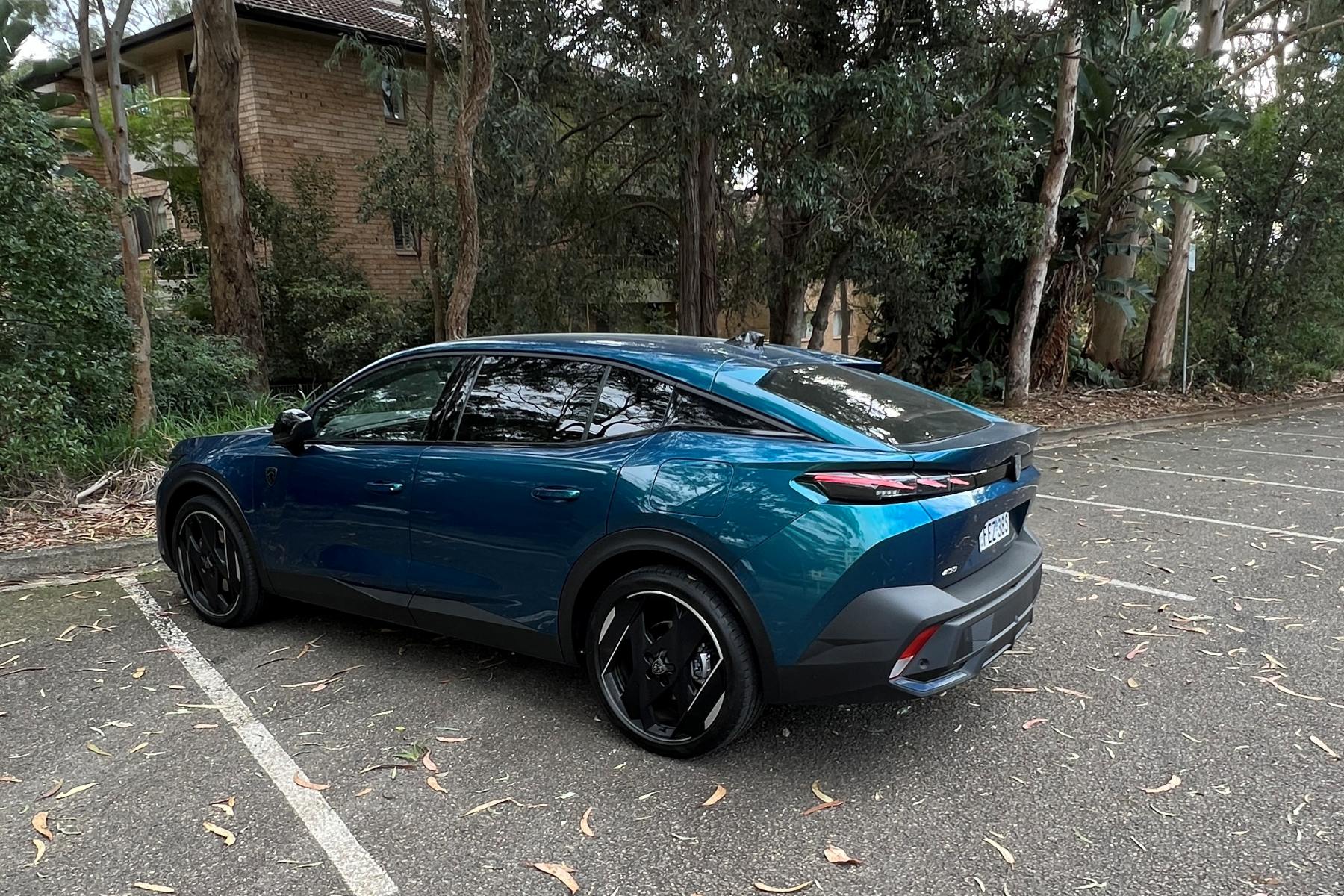 2024 Peugeot 408 PHEV rear quarter 1