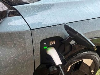 charging an EV in the rain
