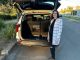 2025 Kia Carnival GT-Line hybrid boot with person 1