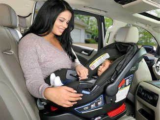 New mum in car with baby