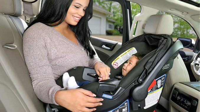 New mum in car with baby