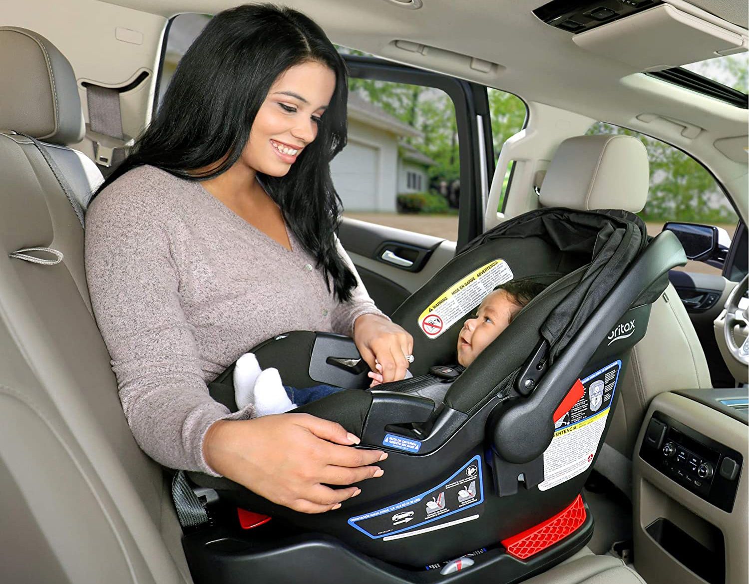 New mum in car with baby
