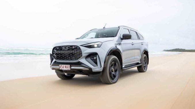2025 Isuzu MU-X X-TERRAIN SlateGrey frot quarter on sand 1