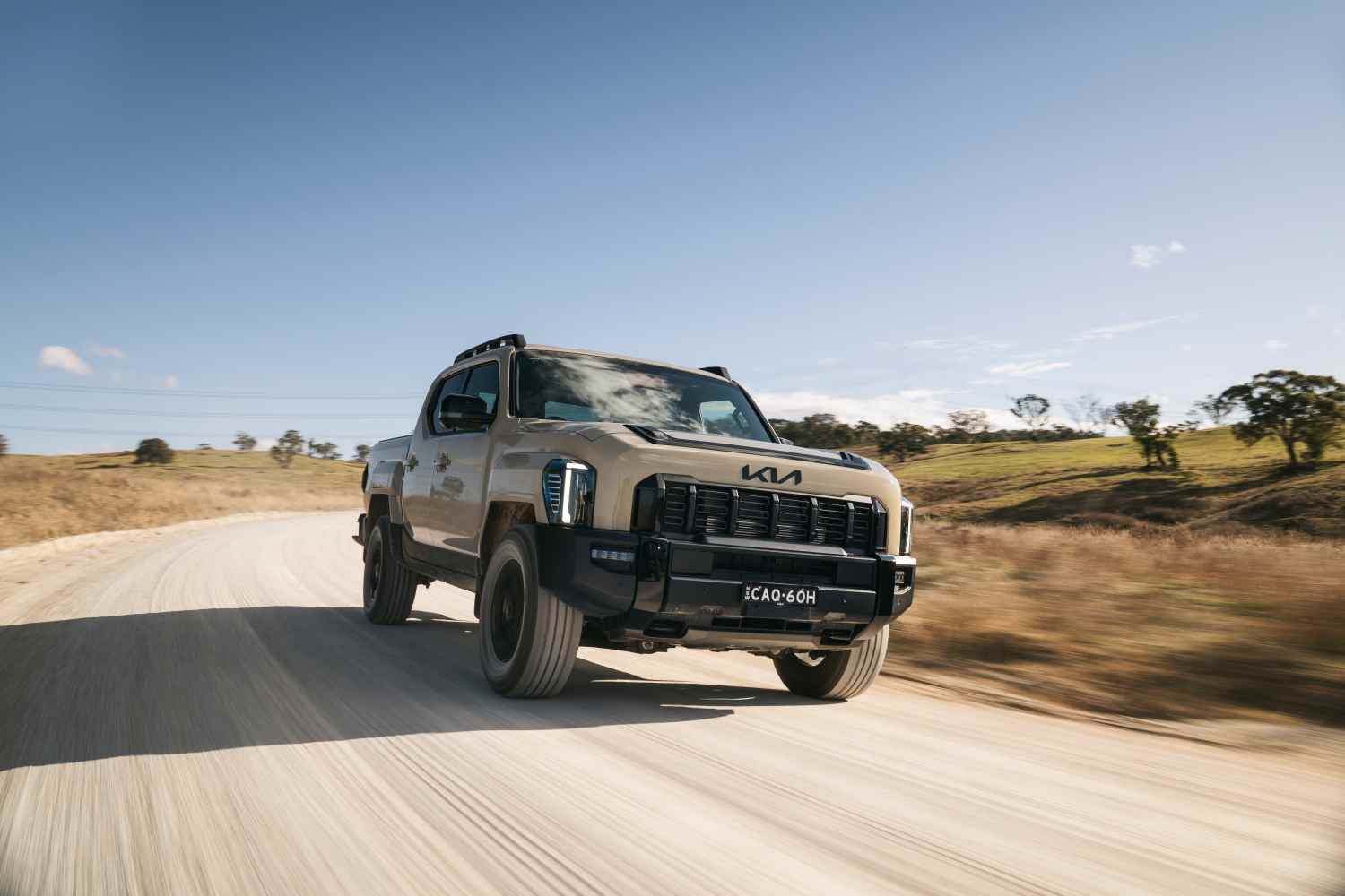 KIA - TASMAN_TAN_X-Pro dirt road driving 2 - Copy