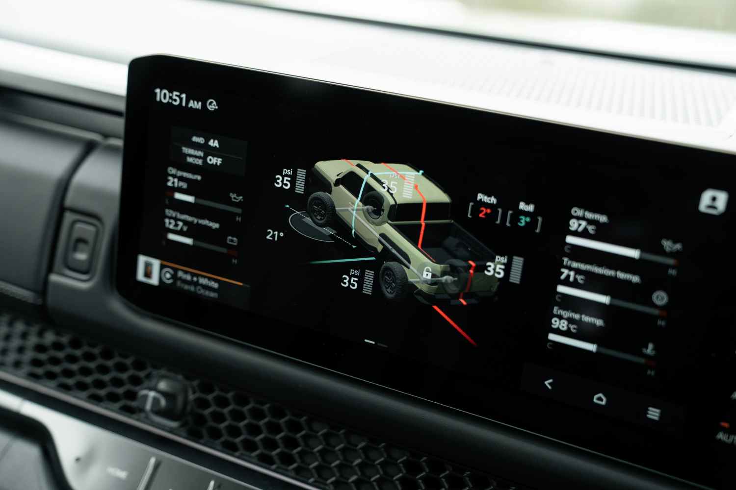 KIA - TASMAN_TAN_X-Pro dirt road driving screen 1
