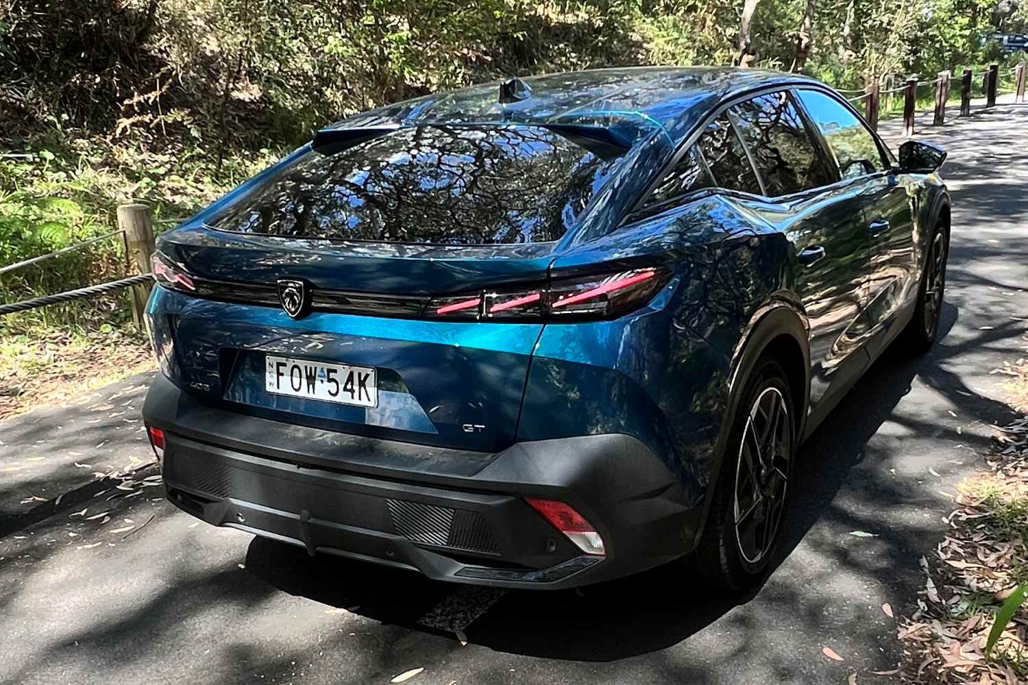Peugeot 408 GT Hybrid rear quarter 1