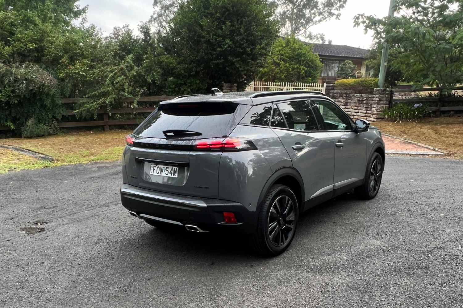 Peugeot 2008 GT Hybrid rear quarter 1