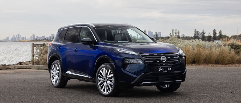 2026 Nissan MY26 X-TRAIL Ti-L - Blue Exterior - Front 3-4 (grass)