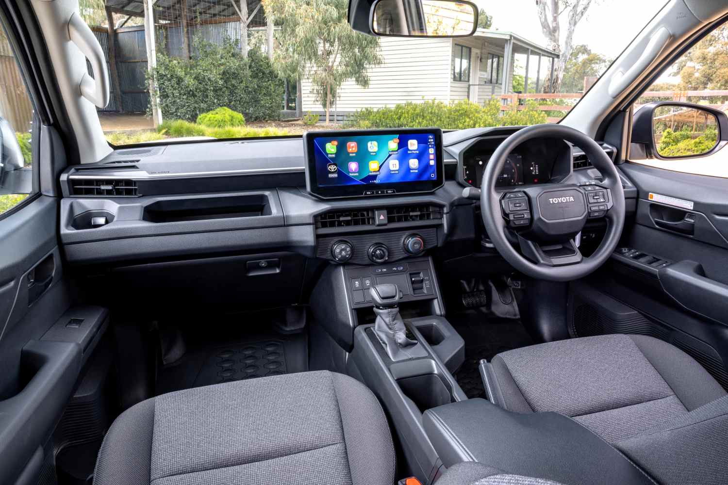 Toyota HiLux Workmate pickup front interior 1