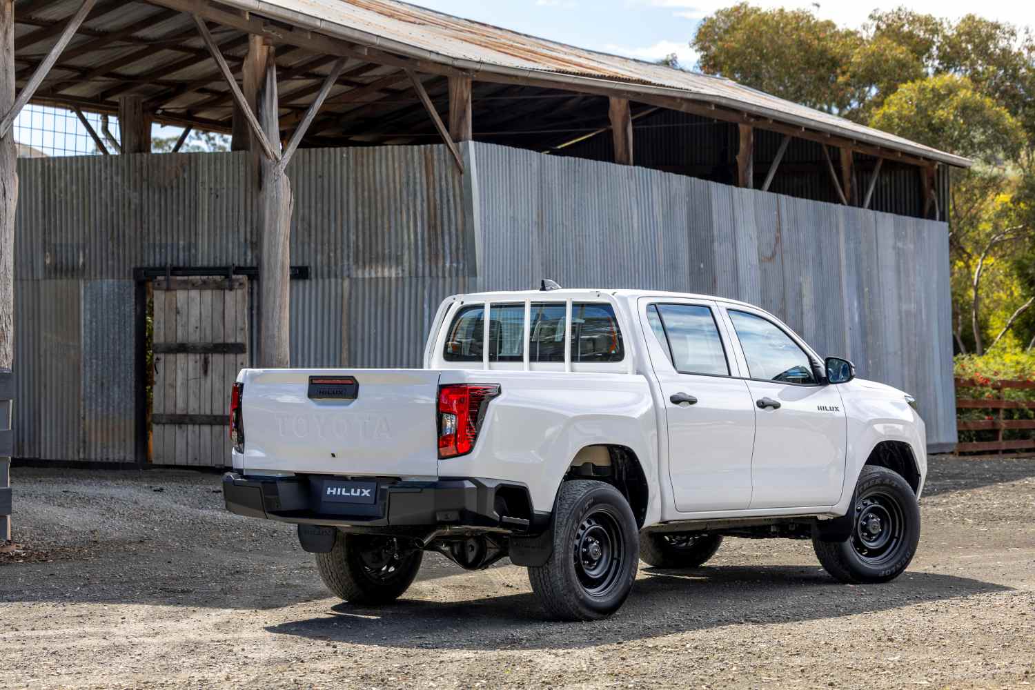Toyota HiLux Workmate pickup rear quarter 1