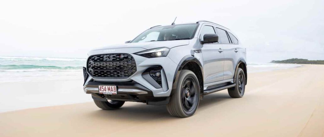 2025 Isuzu MU-X X-TERRAIN SlateGrey frot quarter on sand 1
