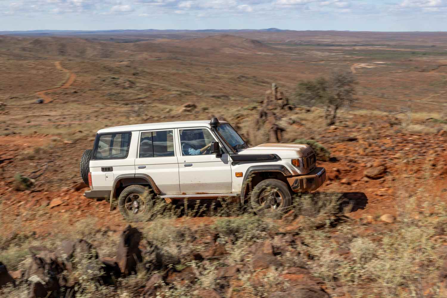 2026 Toyota LC 76 GXL Wagon driving outback 1