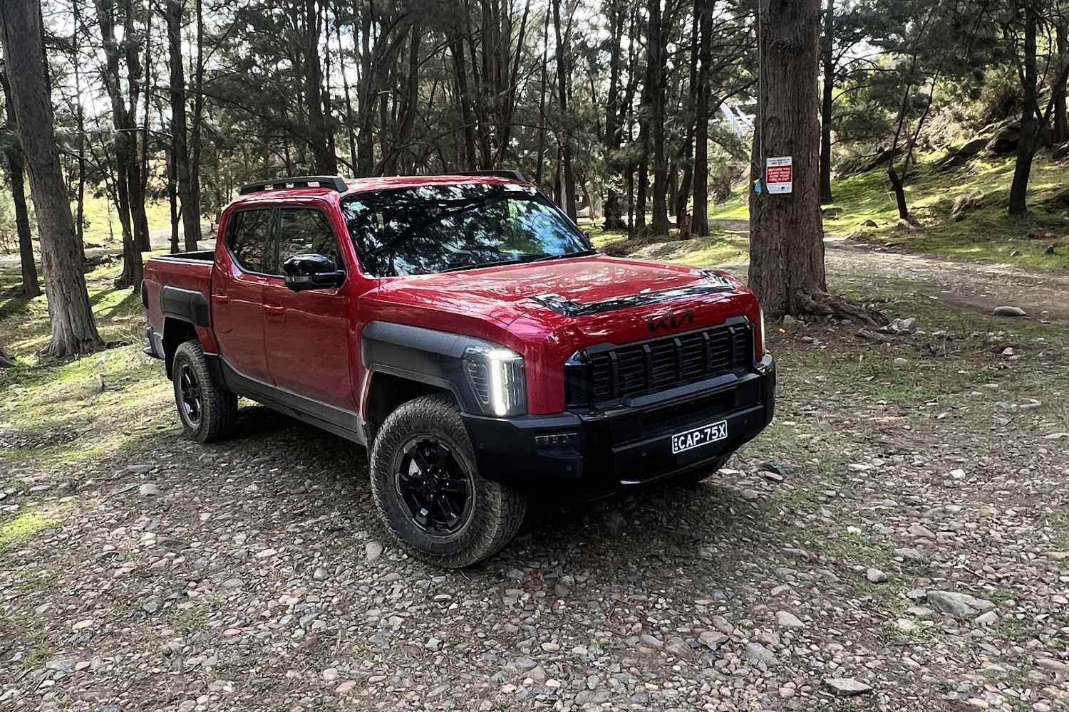 KIA - TASMAN_X-Pro red front