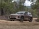 2026 Toyota RAV4 Cruiser AWD Hybrid front driving on dirt road 2