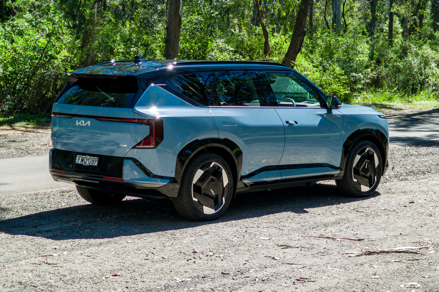 2026-kia-ev5-gt-line-exterior-rear-driver
