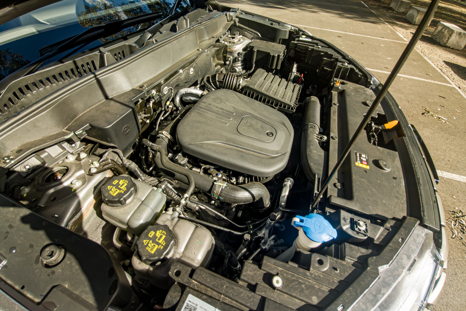 2026 Haval H6 engine bay with bonnet open showing PHEV powertrain components