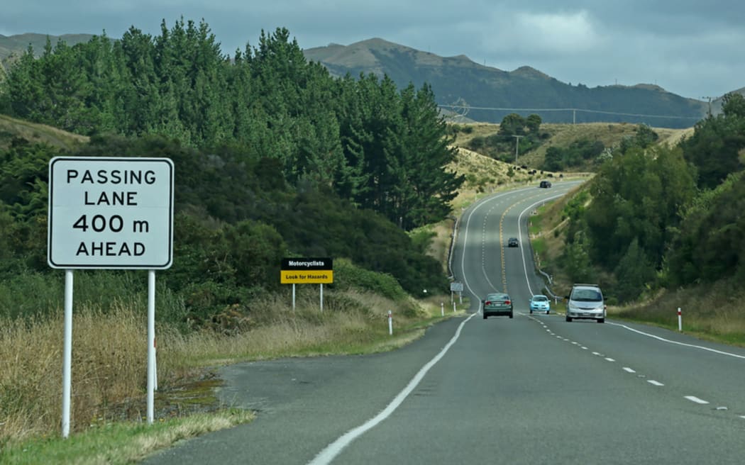 passing lane ahead sign