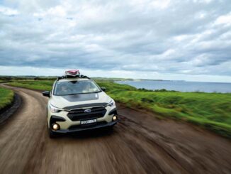 MY26 Crosstrek AWD Rip Curl SE Driving Front Coast_batch