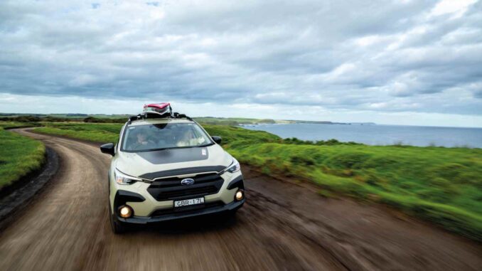 MY26 Crosstrek AWD Rip Curl SE Driving Front Coast_batch