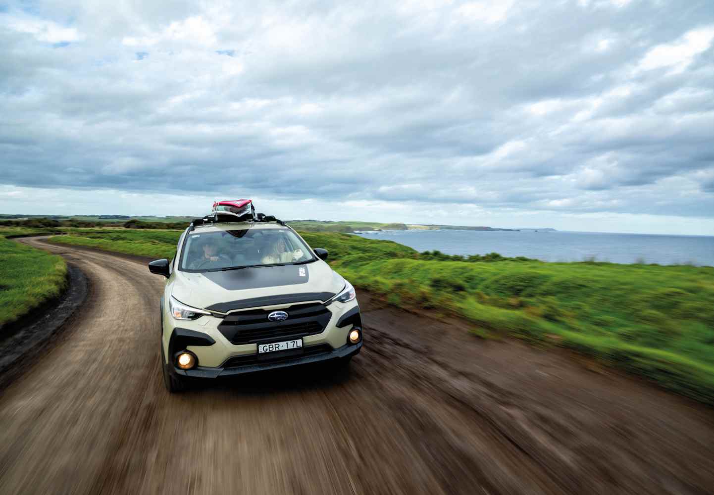 MY26 Crosstrek AWD Rip Curl SE Driving Front Coast_batch